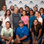 Group photo of AmeriVet Corporate team from 100th Practice Party at Andretti Indoor Karting and Games
