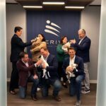Happy team members with their pets at the AmeriVet office