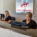 veterinary team members at front desk
