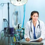 two veterinarians reviewing paperwork