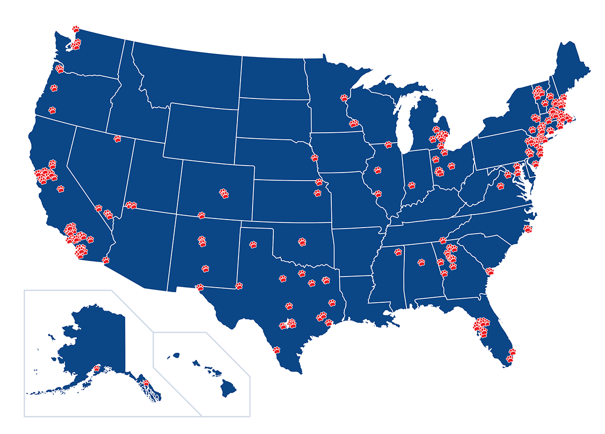 Map of AmeriVet Veterinary Partners' practices in the United States, shown with red paw prints on a blue map